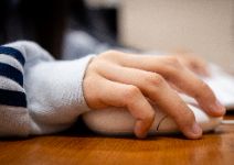  Hand on Computer Mouse